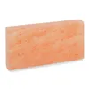 A rectangular pinkish-orange salt block on a white background. Produktbild-Vorschau