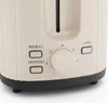 A close-up view of the control panel of a beige toaster. Anteprima dell’immagine prodotto