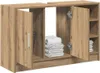 A wooden bathroom cabinet with open doors, showing folded towels inside. Náhled obrázku produktu