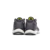 The back view of a pair of gray Skechers sneakers with white soles and green accents on a white background. Náhled obrázku produktu