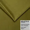A folded piece of olive green fabric with a label showing product details. Produktbild-Vorschau