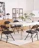 A modern meeting room with a white table and black chairs. Náhľad obrázku produktu