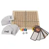 A wooden multiplication board game with cards, dice, and playing pieces. Produktbild-Vorschau