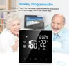 A thermostat is displayed in front of a smiling elderly couple, with text describing its features. Produktbild-Vorschau