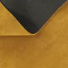 A close-up view of a yellow rug, showing its texture and the anti-slip backing. Produktbild-Vorschau