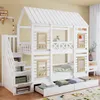 A white wooden bunk bed shaped like a house, with stairs and storage drawers, in a child's bedroom. Anteprima dell’immagine prodotto