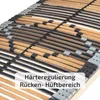 A close-up view of a wooden bed slat base with adjustable firmness elements. Produktbild-Vorschau