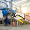 A gloved hand holds a pair of tin snips in a workshop setting with a vehicle in the background. Anteprima dell’immagine prodotto