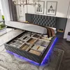 A bed with its storage compartments open, showcasing organized items and illuminated by LED lights. Náhled obrázku produktu