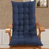 A navy blue cushion on a wooden rocking chair. Produktbild-Vorschau