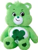 A green stuffed bear with a shamrock on its belly and hearts on its feet, sitting against a white background. Produktbild-Vorschau