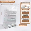 A vacuum-sealed bag filled with folded bedding, with accompanying marketing text and diagrams. Produktbild-Vorschau