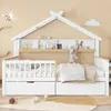 A child's bed with a house-shaped frame and built-in shelving, decorated with children's books and toys. Náhled obrázku produktu