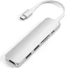 A silver USB-C hub with multiple ports and a white cable is shown against a white background. Voir les images du produit
