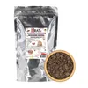 A bag of Belgian dark chocolate chips next to a wooden bowl filled with the same chocolate chips. Podgląd zdjęcia produktu