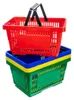 Two stacked shopping baskets, one red on top of a green and blue basket with a yellow stripe. Náhled obrázku produktu