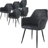 A set of dark gray dining chairs with armrests and metal legs, presented on a white background.