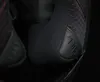 A close-up view of a black helmet's interior padding and a "PULL" tab. Voir les images du produit