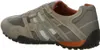 Side view of a single beige and orange athletic shoe. Produktbild-Vorschau