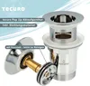 A close-up view of a chrome pop-up drain assembly with a hair sieve, presented with descriptive text and branding. Produktbild-Vorschau