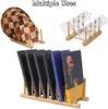 A collage of different uses for a wooden organizer, including holding plates, glasses, and books. Produktbild-Vorschau