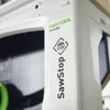 Close-up of a label on a white machine. Podgląd zdjęcia produktu