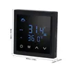 A digital thermostat with a black frame and a blue LED display showing temperature readings and icons. Voir les images du produit