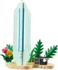 A LEGO model of a surfboard with tropical plants and a radio. Náhled obrázku produktu