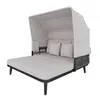 A modern outdoor daybed with a canopy and cushions, presented on a white background. Podgląd zdjęcia produktu