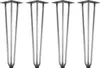 Four metal table legs on a white background.