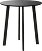 A black round table with three legs against a white background. Produktbild-Vorschau