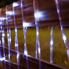 Close-up of LED lights attached to a railing. Náhled obrázku produktu