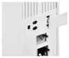Close-up view of the back panel of a white electronic device, showing various ports and a removable plastic cover. Podgląd zdjęcia produktu