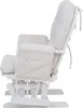 A side view of a white wooden rocking chair with cream-colored corduroy cushions. Anteprima dell’immagine prodotto