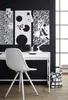 A desk setup with a chair, desk, and bulletin boards on a black wall. Náhľad obrázku produktu