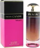 Parfumflakon „Prada Candy Night“ mit Farbverlauf von Schwarz zu Pink, daneben pink-schwarze Verpackung mit goldenen Akzenten. Produktbild-Vorschau