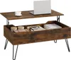 A lift-top coffee table with storage, a laptop, and a cup of coffee. Produktbild-Vorschau