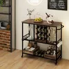 A bar cart with wine bottles, glasses, and fruit is shown in a room setting. Podgląd zdjęcia produktu