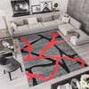 A modern living room with a sectional sofa, rug, and coffee table.