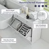 A bathroom cabinet with drawers and a laundry hamper, next to a bathtub. Anteprima dell’immagine prodotto