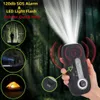 A hand holding a black emergency radio with a bright light beam emanating from the top, set against a blurred forest background. Smaller circular insets show scenes of a person walking in a forest, a person using a flashlight, and a lit tent. Produktbild-Vorschau