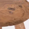 A close-up view of the textured surface of a wooden stool. Produktbild-Vorschau