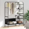 A black metal garment rack with shelves, displaying clothes and folded items. Náhled obrázku produktu