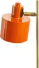 A close-up shot of an orange desk lamp with brass accents. Produktbild-Vorschau