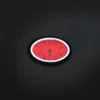 A close-up of a thermometer on a black surface. Produktbild-Vorschau