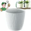 A cartoon gardener gives a thumbs up next to a white textured pot, with two smaller potted plants visible in the background. Anteprima dell’immagine prodotto