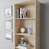 A bookshelf with books and decorative items. Voir les images du produit