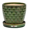 A green ceramic plant pot with a decorative pattern and a matching saucer, set against a white background. Náhled obrázku produktu