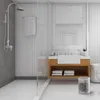 A modern bathroom with a shower, sink, and vanity. Anteprima dell’immagine prodotto