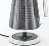 A close-up view of a kettle and its base. Anteprima dell’immagine prodotto